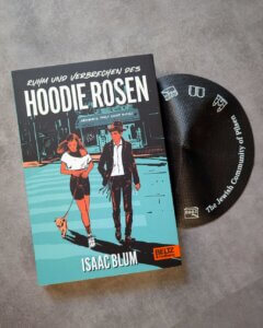 Jugendbuch von Isaac Blum:
Ruhm und Verbrechen des Hoodie Rosen. Das Taschenbuch liegt neben einer schwarzen Kippa